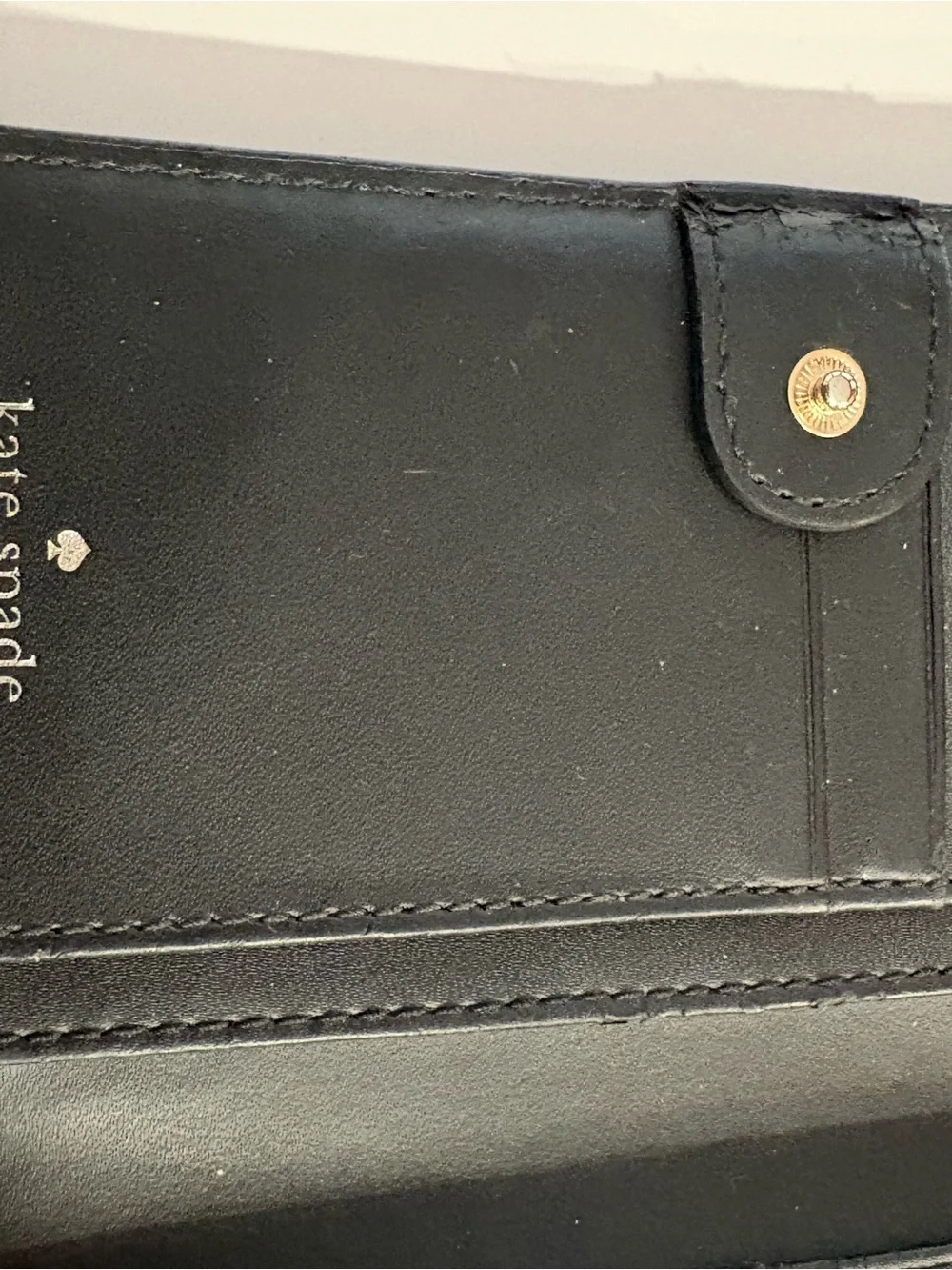 Kate Spade Black Pebbled Leather Wallet with Gold Plaque